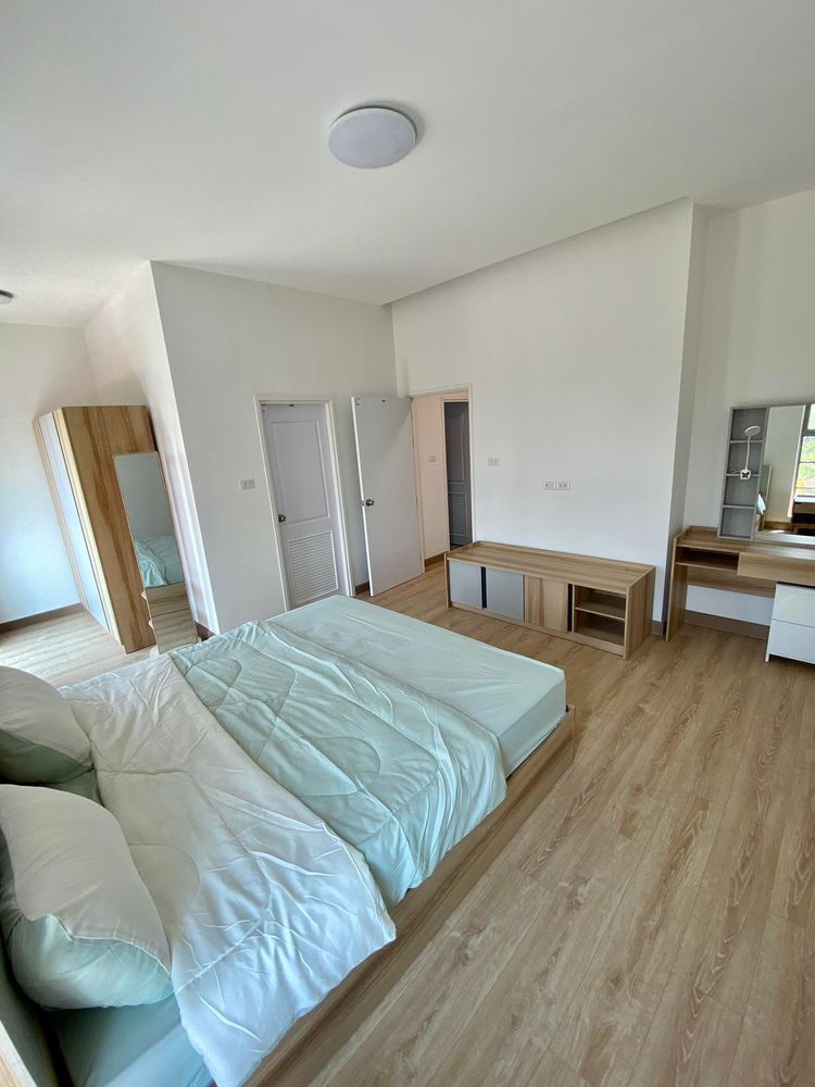 ภาพแบบบ้าน-บ้านแฝด 2 ชั้น หน้ากว้าง จอดรถ 3 คัน